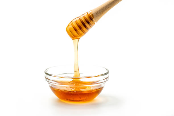 istock Honey bowl and dipper 1472310162