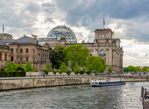 Reichstag building and Spree river at sunset, Berlin, Germany