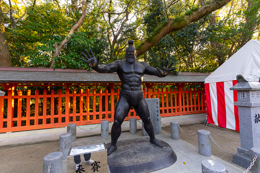 Fukuoka, Japan - Dec 27, 2022 : Statue of a sumo wrestler of ancient times at the Sumiyoshi shrine in Fukuoka, Japan on Dec 27, 2022.