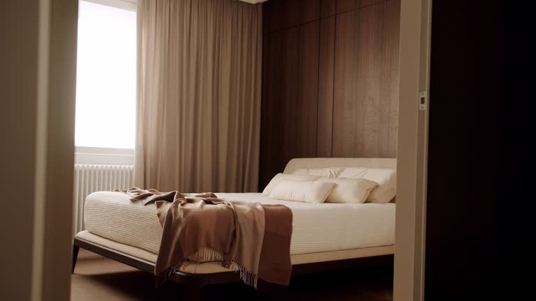 Elegance interior design. Minimalist Bedroom. Hotel Bedroom Interior and bed