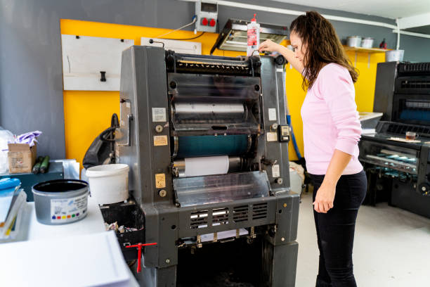 istock mature woman working in a printing press 1472324556