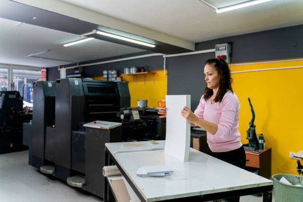 istock mature woman working in a printing press 1472325391
