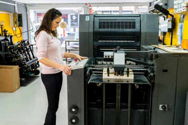 istock mature woman working in a printing press 1472326140