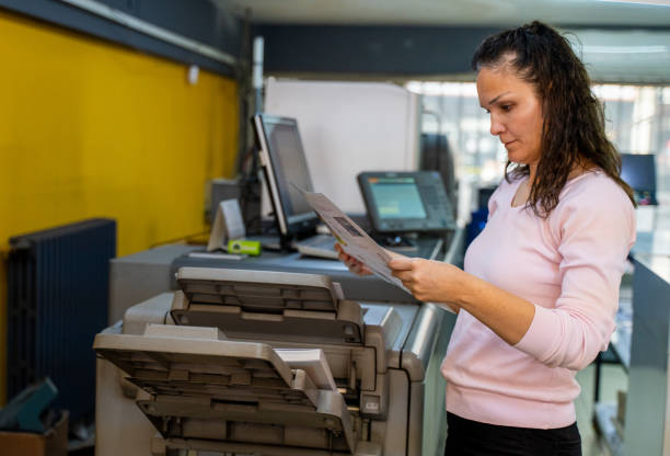 istock mature woman working in a printing press 1472327042