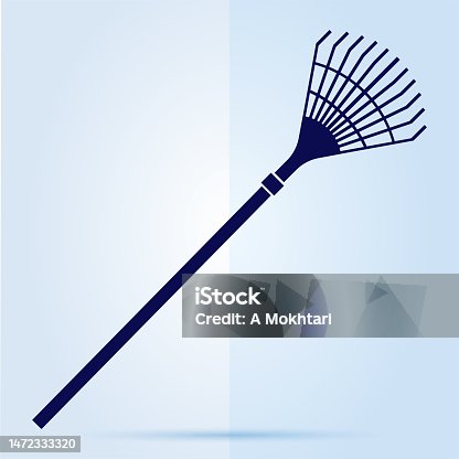 istock Garden rake icon on blue background. 1472333320