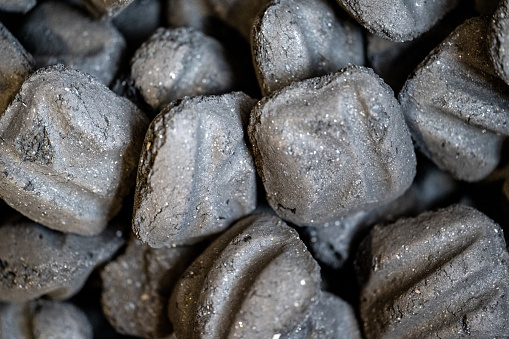 Close-up of charcoal briquets