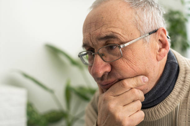 istock Portrait elderly man on gray background 1472338043