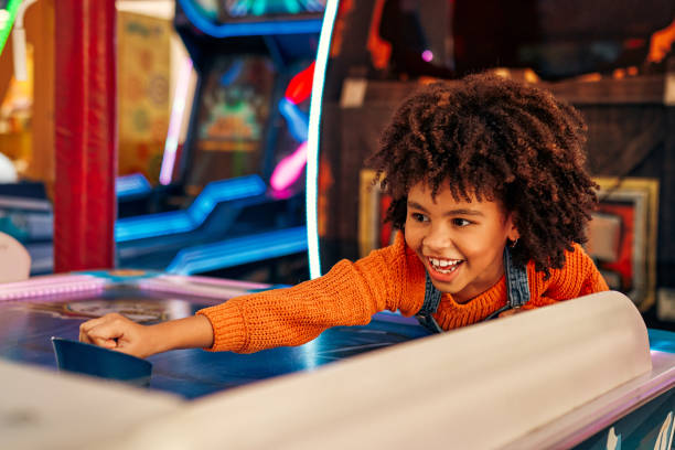 istock Kids having fun on a carnival Carousel 1472340319