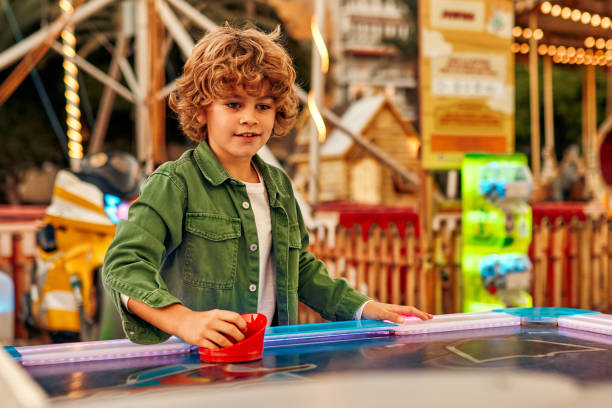 istock Kids having fun on a carnival Carousel 1472340340