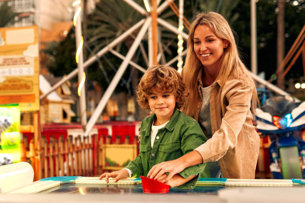 istock Kids having fun on a carnival Carousel 1472340369