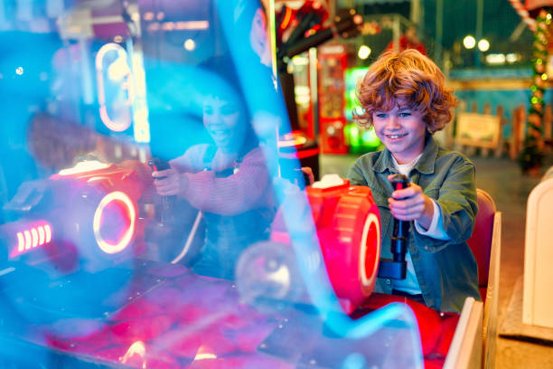 istock Kids having fun on a carnival Carousel 1472340469