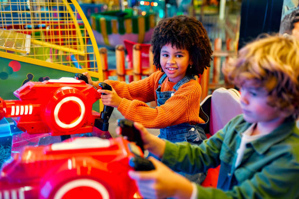Kids having fun on a carnival Carousel stock photo