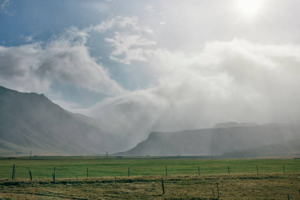 Mountains range and field in Snaefellsnes, Iceland. Heavenly light over landscape.