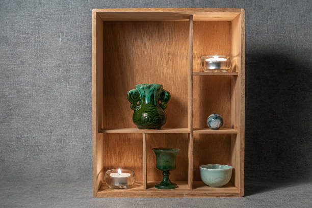 istock A vertical box or drawer with partitions, shelves, for distributing and storing small items or artifacts, as a background or template for your creativity. Interior item, showcase, storage system. 1472344712