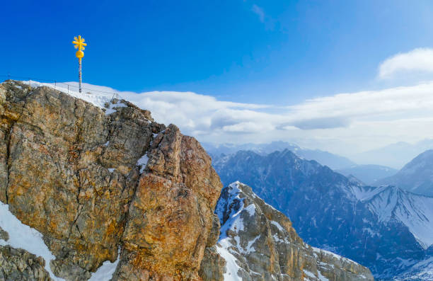 istock Summit Cross of Mountain Zugspitze Germany 1472352753