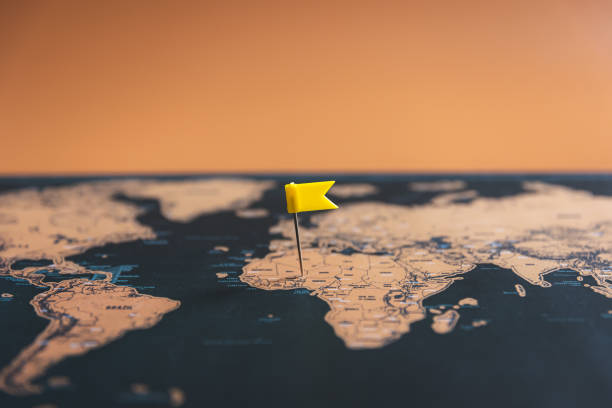 istock Small flag on the map, travel concept. 1472352777
