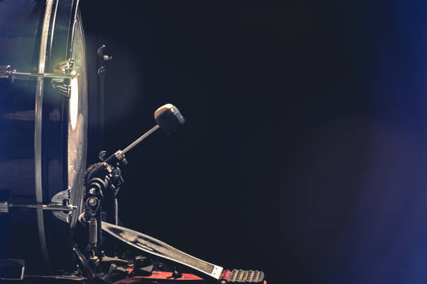 bass drum with pedal, musical instrument on black background. - bass drum imagens e fotografias de stock