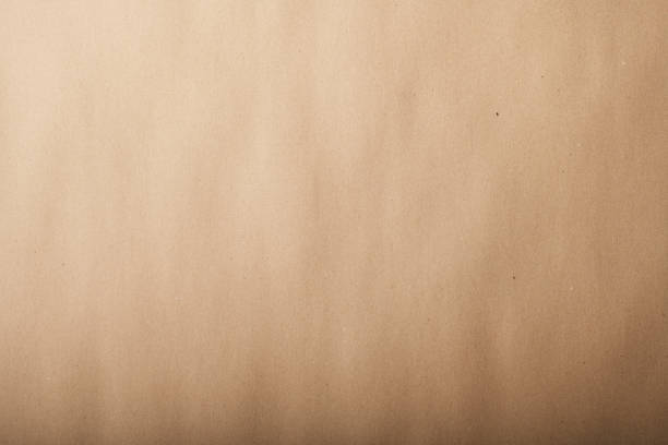istock Cardboard texture, beige paper, design background, copy space. Recyclable material, has flecks of pulp. 1472355614