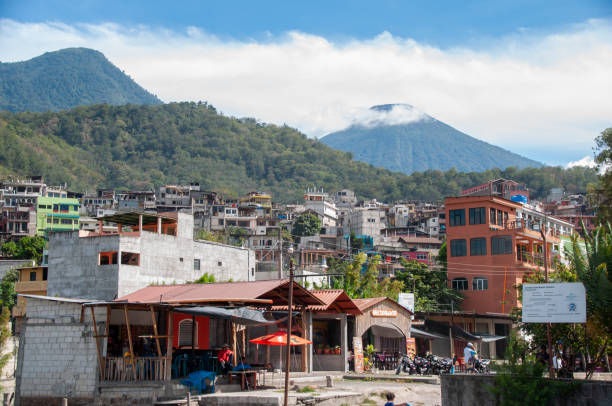 Santiago Atitlan, Guatemala - 20 March 2018: Sunny jetty at the coast of lake Atitlan with view on colorful houses in Santiago Atitlan, Guatemala