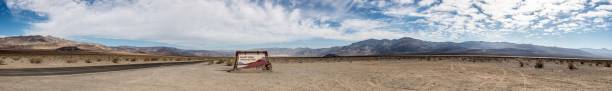 istock Panorama of Death Valley NP Sign 1472369050