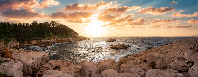 Rocky Coast in a park at Touristic Town, Sorrento, Italy. Amalfi Coast. Nature Background Panorama. Sunset Sky Art Render