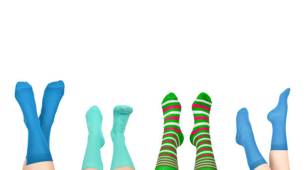 istock Woman in blue socks isolated on white background. Top view. 1472374983