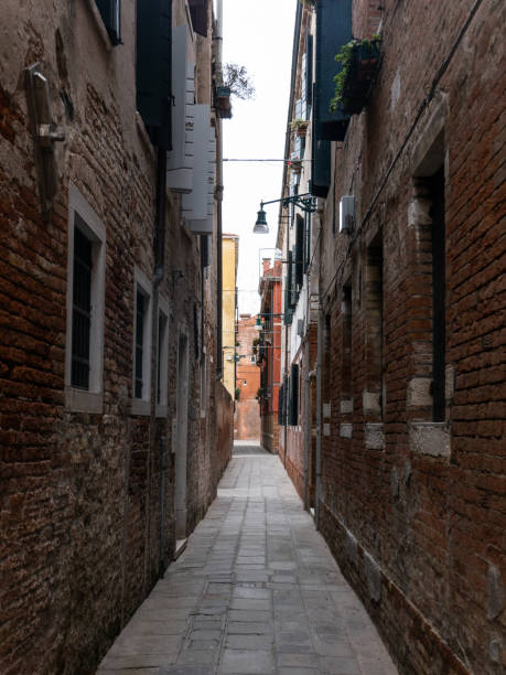 istock Narrow Brick Passageway in Ancient Village 1472375563