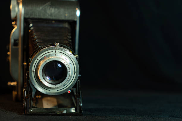Old vintage camera. Lens close-up.