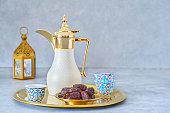 Traditional arabic coffee with dates . Ramadan decor with Arabian coffee set
