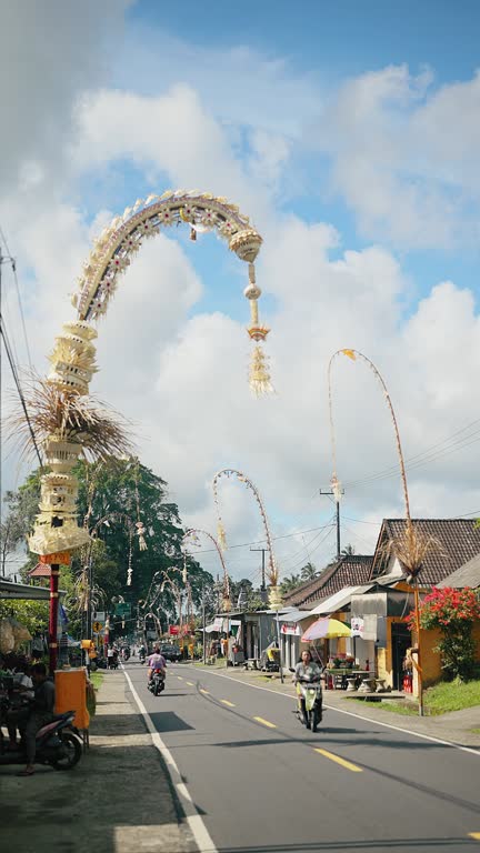Balinese village decorated with Penjor for traditional beautful Galungan Kuningan festival vertical video
