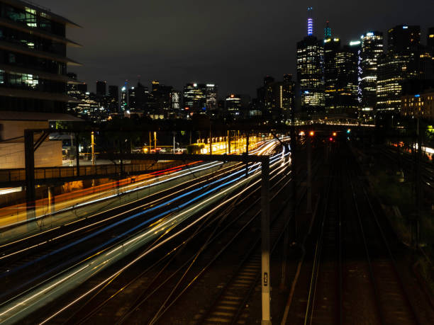 istock Train and train tracks at sunrise 1472384595