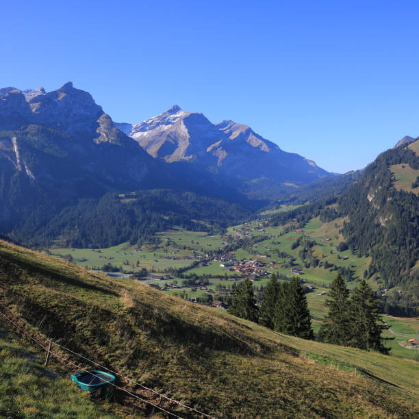 istock Village Gsteig Bei Gstaad and high mountains. 1472387748