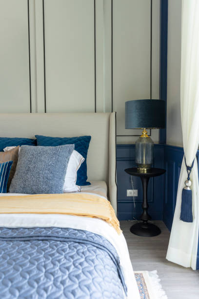 istock Cottage style bedroom in blue and yellow bedding interior. 1472389779