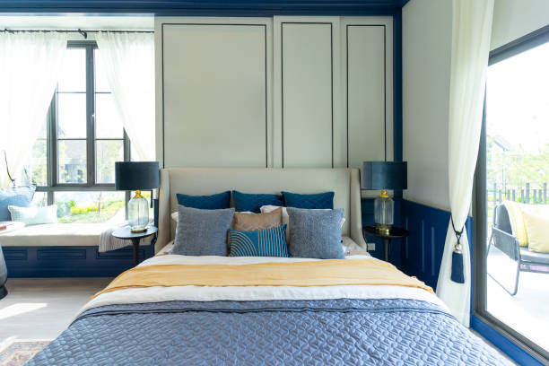 istock Cottage style bedroom in blue and yellow bedding interior. 1472389782