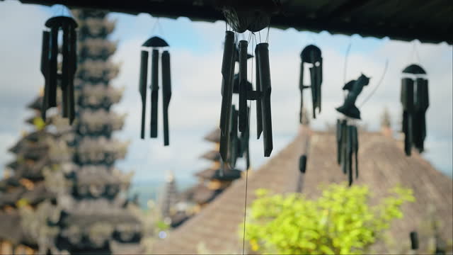 Wind chimes gently swaying on the wind