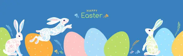 Vector illustration of Happy Easter greeting graphic flat design with white rabbits jumping at pastel colored Easter eggs.