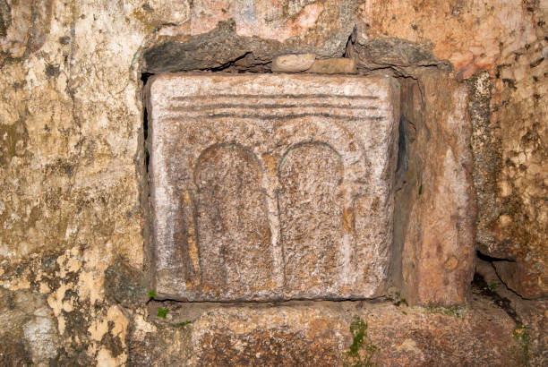 istock Arches carved in stone. Ancient symbols. 1472399229