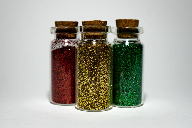 istock Colorful glitter beauty products shiny creative sparkles bottle 1472399333