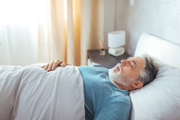 Rest and Recharge. Mature Caucasian Man Sleeping Soundly stock photo