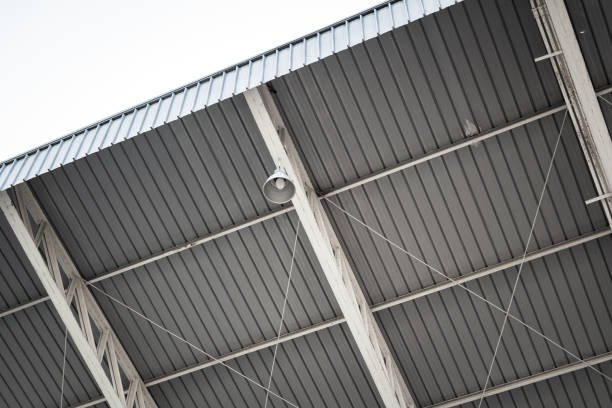istock An electric floodlight at football stadium. 1472403008