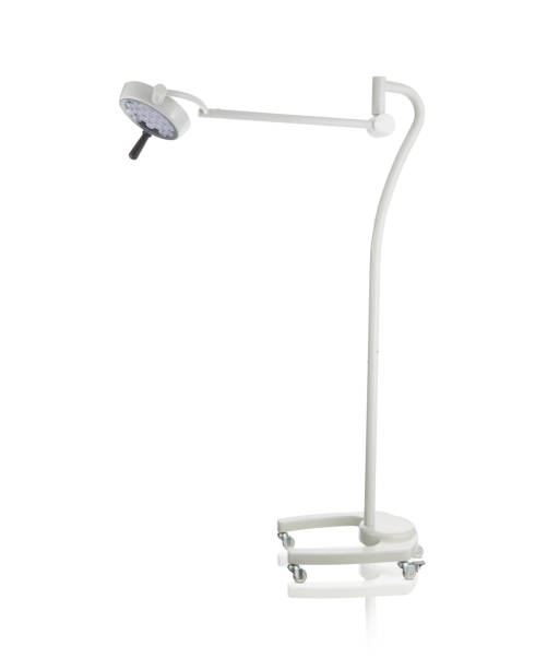 istock Modern medical equipment - adjustable surgery lamp in operating room 1472406424