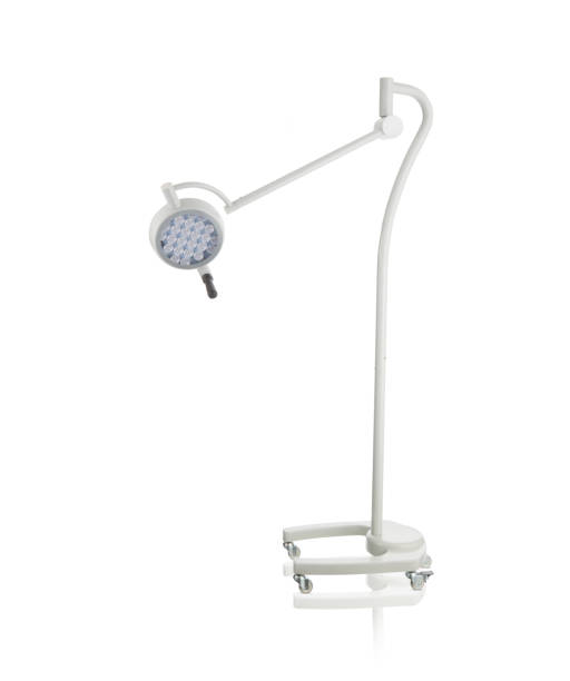 istock Modern medical equipment - adjustable surgery lamp in operating room 1472406427