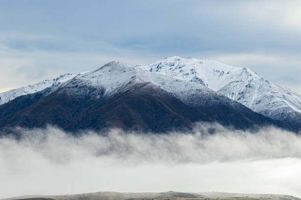 Frost lifting near Bog Roy station on the Omarama-Otematata Road, Canterbury, South Island, New Zealand