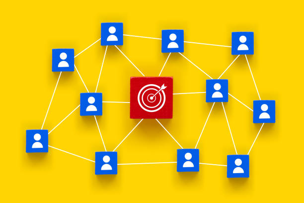 istock Concept of achieving goals by cooperating with team members 1472411528