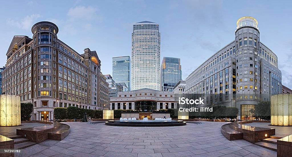 Canary Wharf skyline from Cabot Square, London Wide angle panoramic view of the three tallest skyscrapers of the Canary Wharf skyline as viewed from Cabot Square, London Canary Wharf Stock Photo