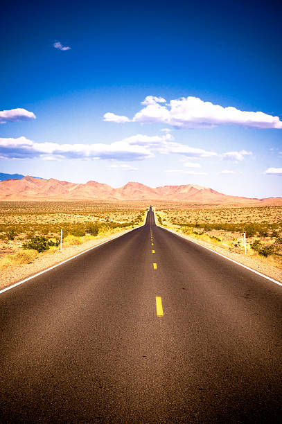 istock vibrant image of highway and blue sky 147242145