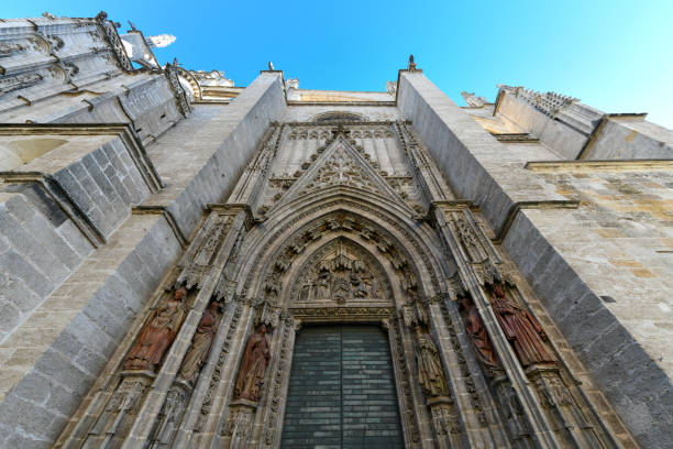 Facade of the Seville Cathedral Gothic style architecture in Seville, Spain.