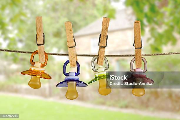 Pacifiers In Line Stock Photo - Download Image Now - Pacifier, Washing, Laundry