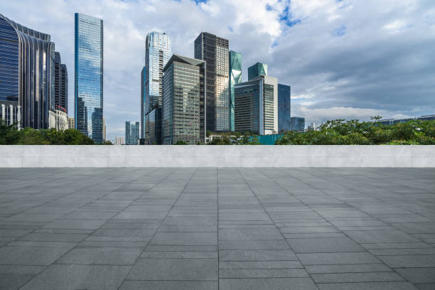 istock Panoramic skyline and buildings with empty concrete square floor 1472424433