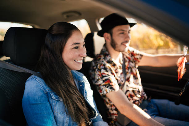 istock Couple traveling by car 1472425279